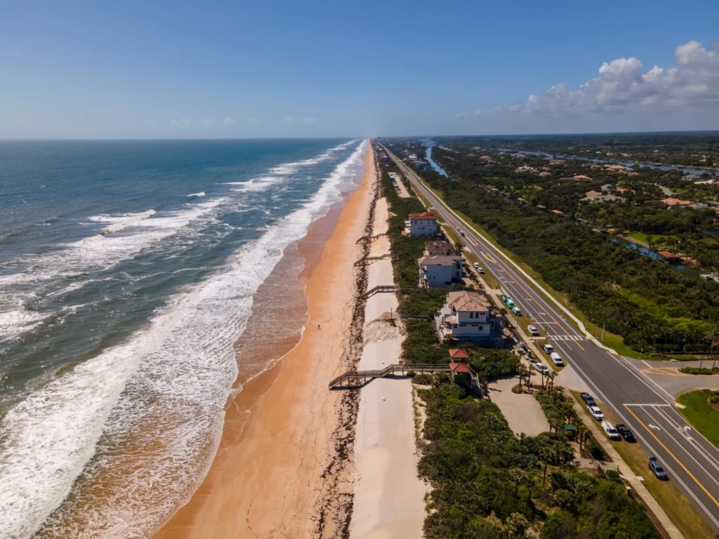 An aerial photo of a new construction home being worked on on the coast of Florida