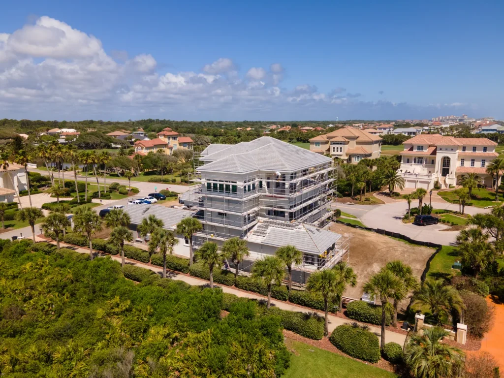 Aerial photo of a new construction build in a neighborhood on the waterfront